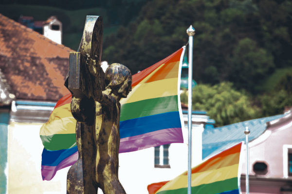 Kreuz und Regenbogenfahne - ©  Imago/Zoonar